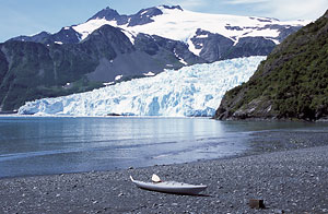 Kayak on beach with Aialik Glacier